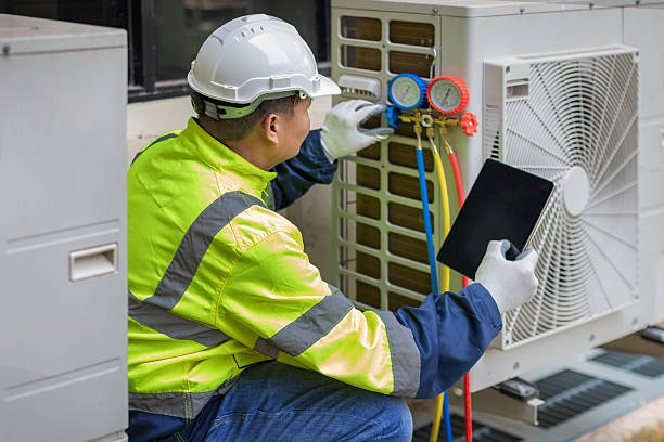 Professional Ac Installation technician working in Bat Cave, NC